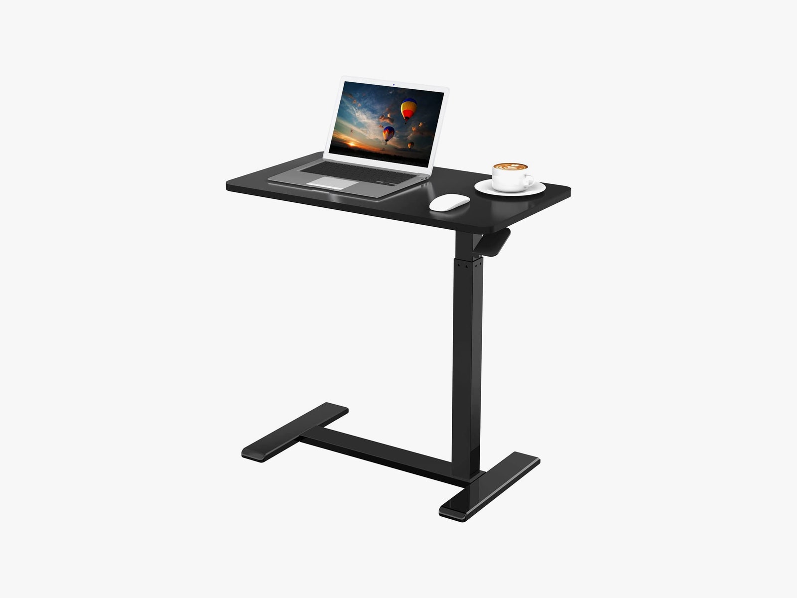 Table réglable Flexispot avec souris d'ordinateur portable et tasse de café sur le dessus.